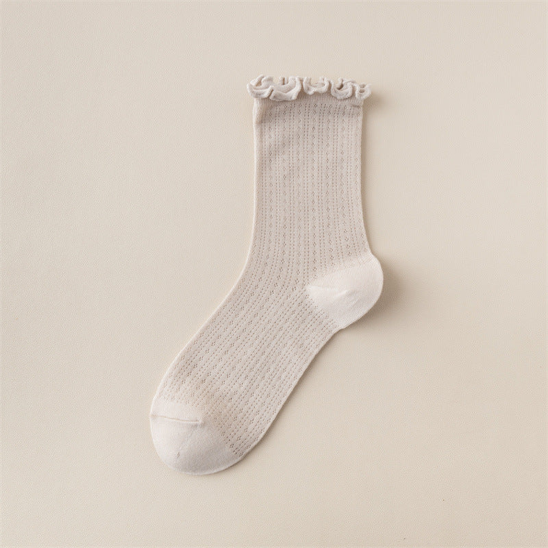 Chaussettes tendance à oreilles en bois de couleur unie