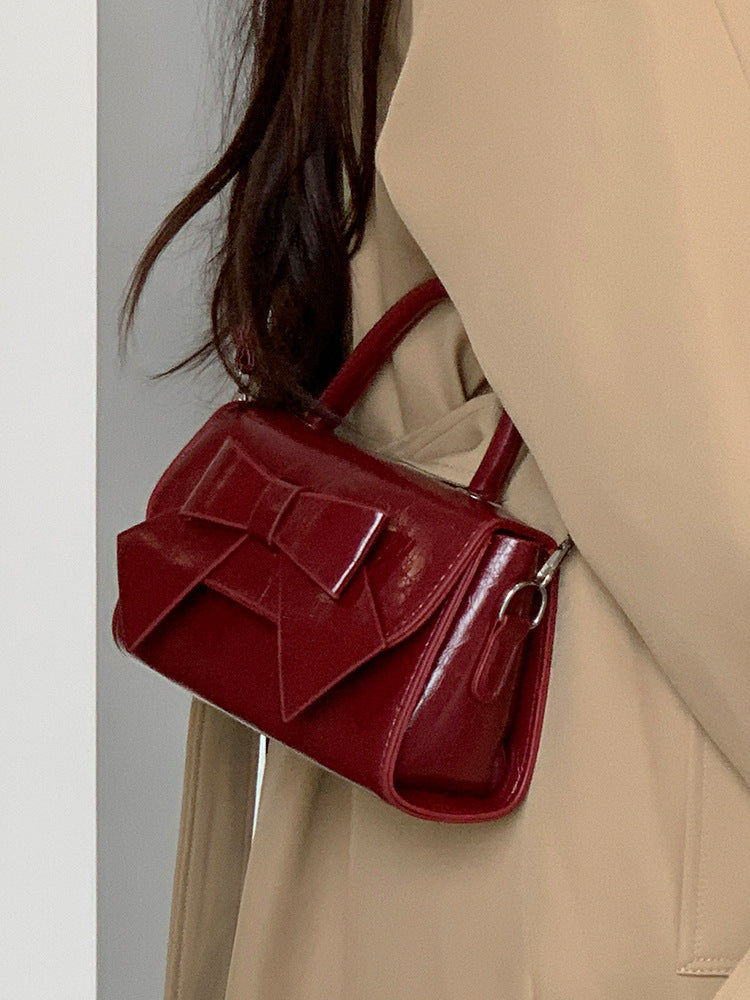 Bolso de mano pequeño cuadrado con lazo de color liso elegante para mujer