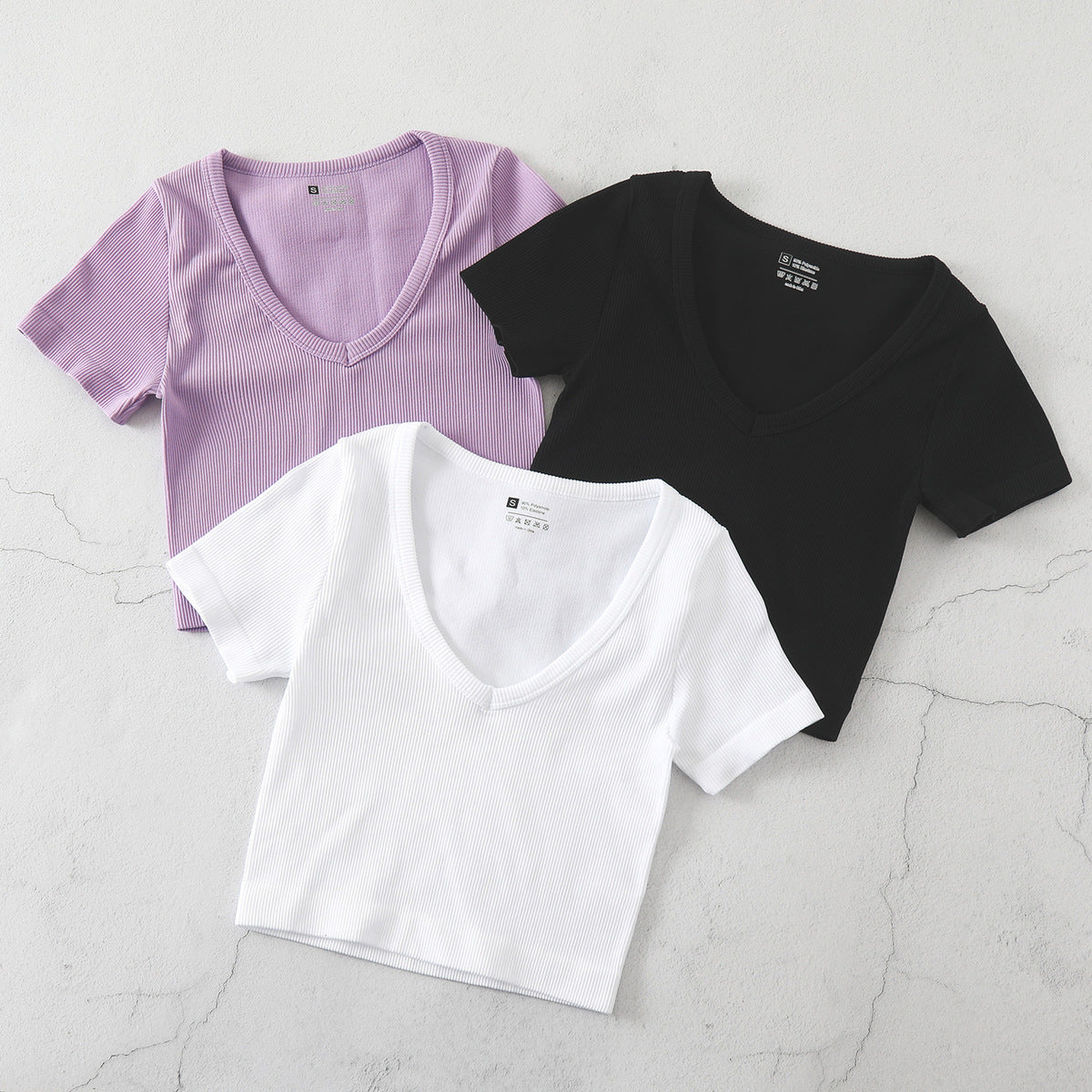 T-shirt de yoga décontracté à col en V et couleur unie pour femme
