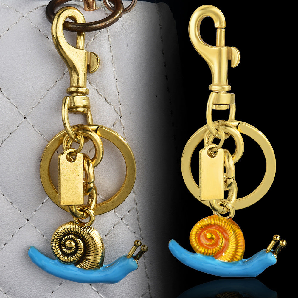 Llavero con colgante de bolso de caracol de moda, aleación orgánica marina, accesorios de moda