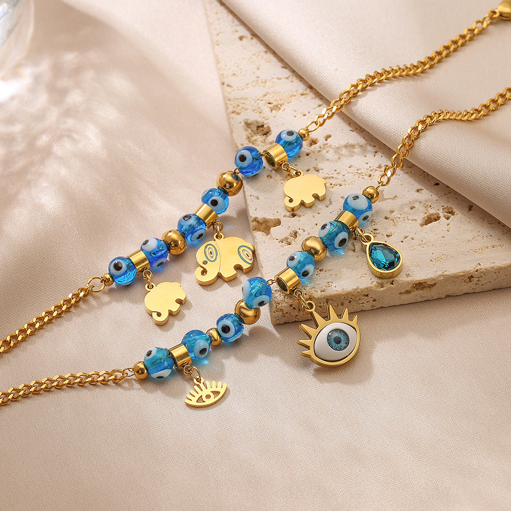 Pulsera con colgante de elefante y cuentas de ojo malvado para mujer