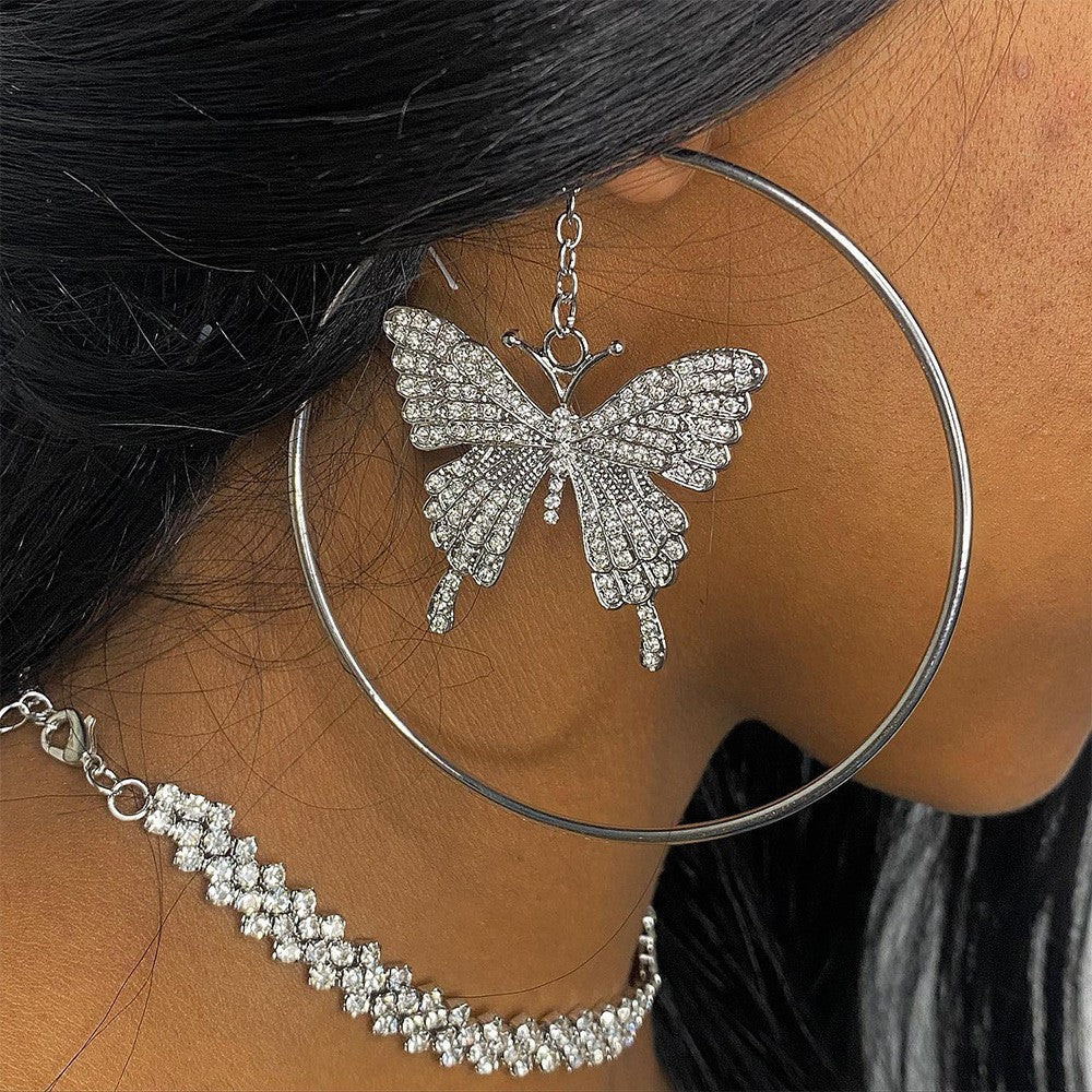 Boucles d'oreilles créoles papillon en strass à la mode exagérée