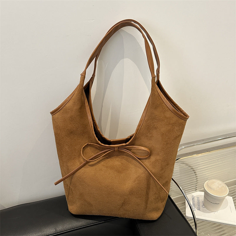 Bolso de mano informal con lazo esmerilado de color liso para mujer