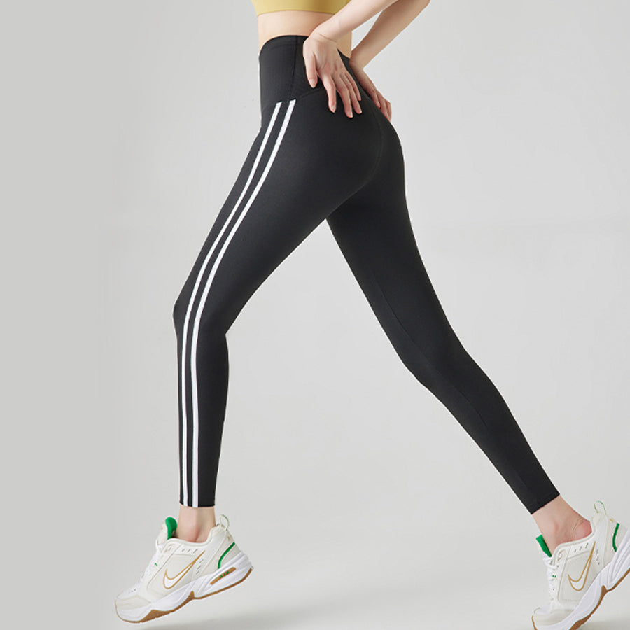Leggings de sport à rayures et coutures tendance pour femmes