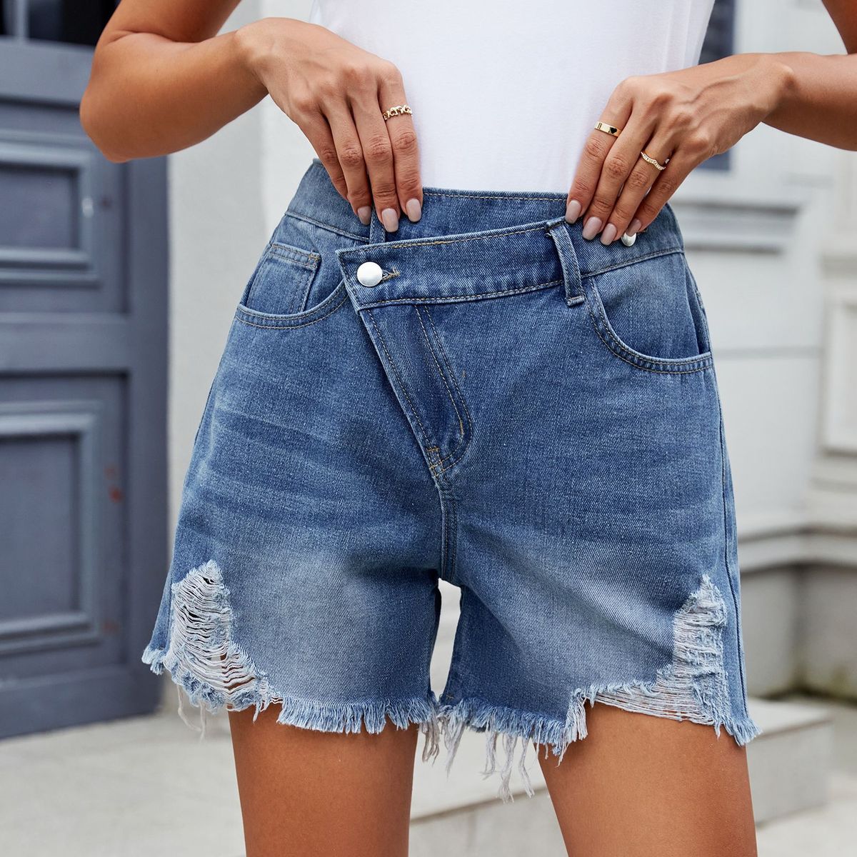 Short en jean à bords irréguliers pour femme