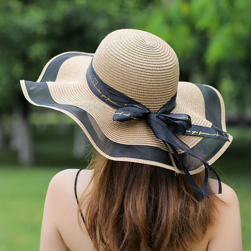 Sombrero de paja con lazo para playa, vacaciones y moda de verano para mujer