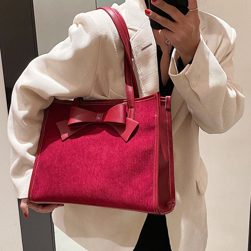 Bolso de mano de verano para mujer, de color liso y moderno.