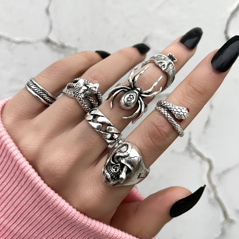 Conjunto de anillos de esqueleto gótico punk creativo de dos cabezas para mujer