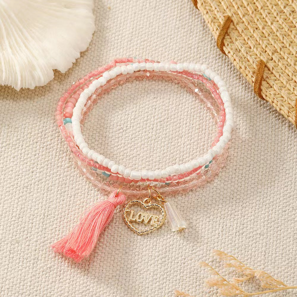 Pulsera de borla rosa con corazón de amor de aleación bohemia