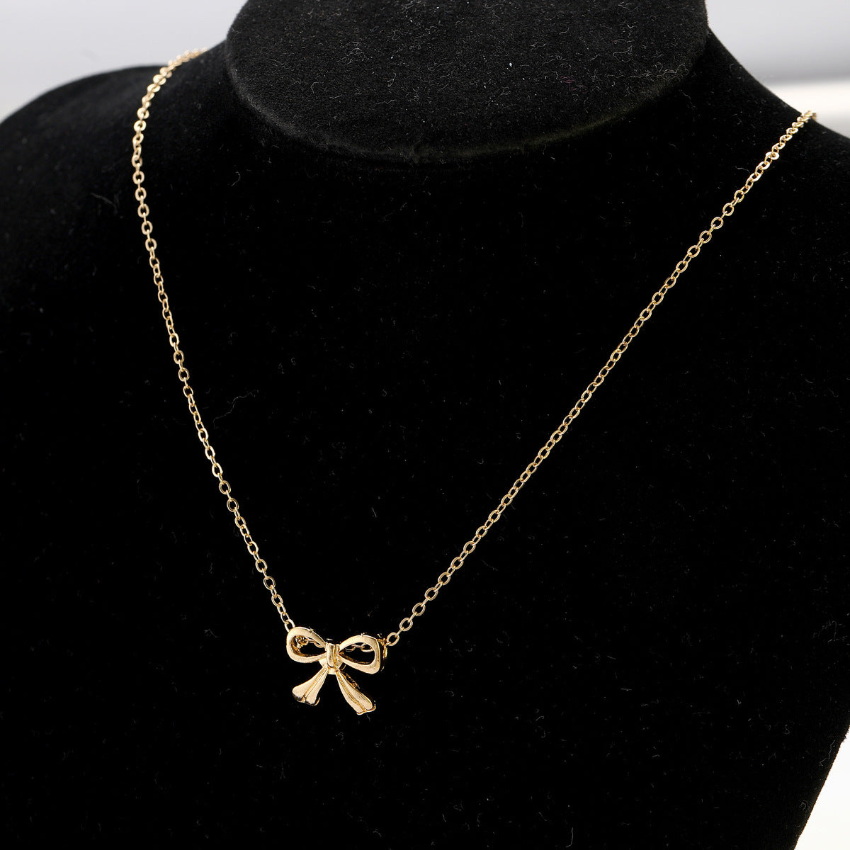 Collar de aleación con lazo sencillo a la moda para mujer