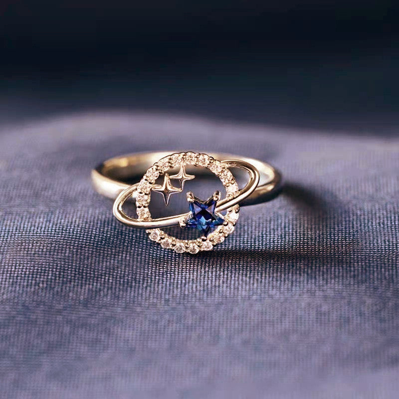 Anillo de aleación con forma de estrella de circonita azul para mujer, estilo viento de ensueño
