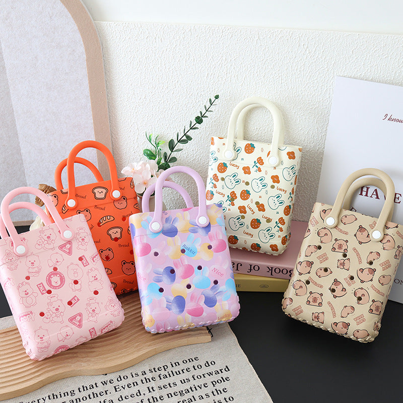 Sac à trou imprimé dessin animé tendance, sac en gelée EVA pour femmes et enfants