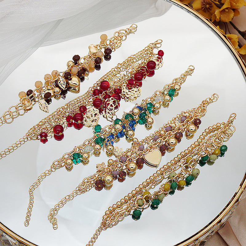 Pulsera bohemia con colgante floral en forma de corazón
