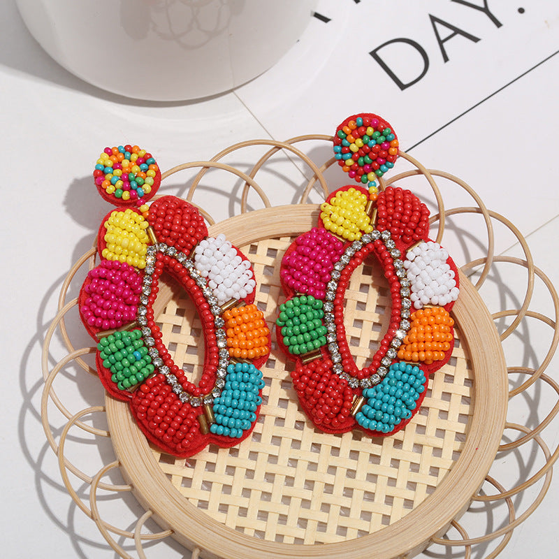 Boucles d'oreilles tressées en perles de riz et fleurs de Bohème