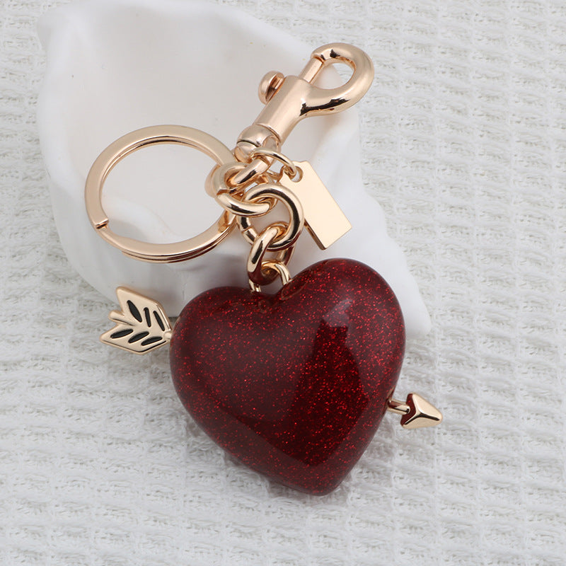 Llavero con colgante de bolso rojo de resina estilo urbano para mujer