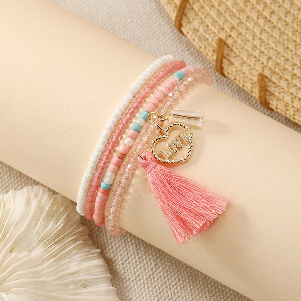 Pulsera de borla rosa con corazón de amor de aleación bohemia