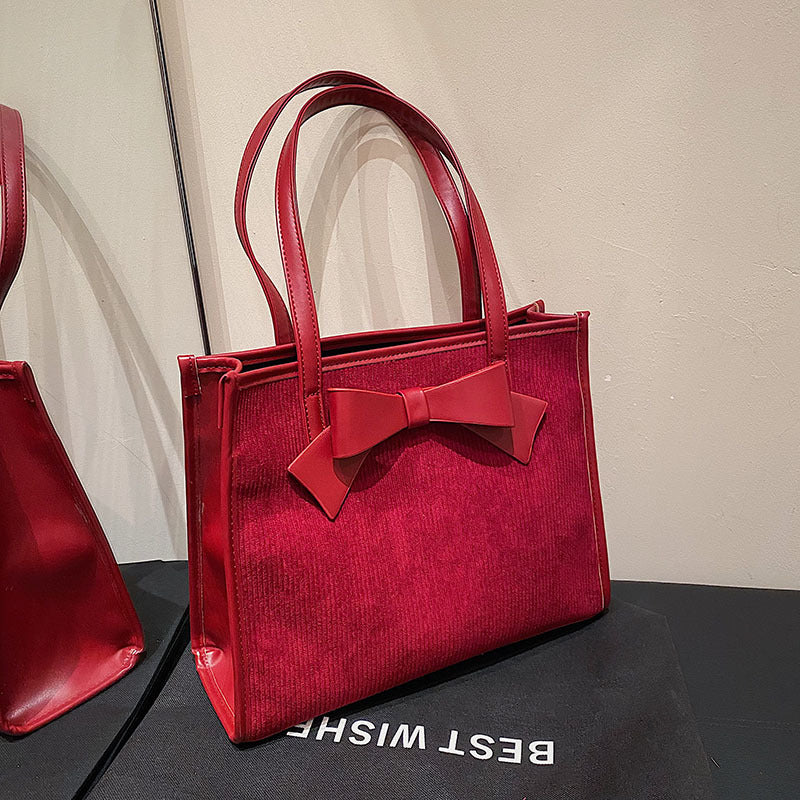 Bolso de mano de verano para mujer, de color liso y moderno.