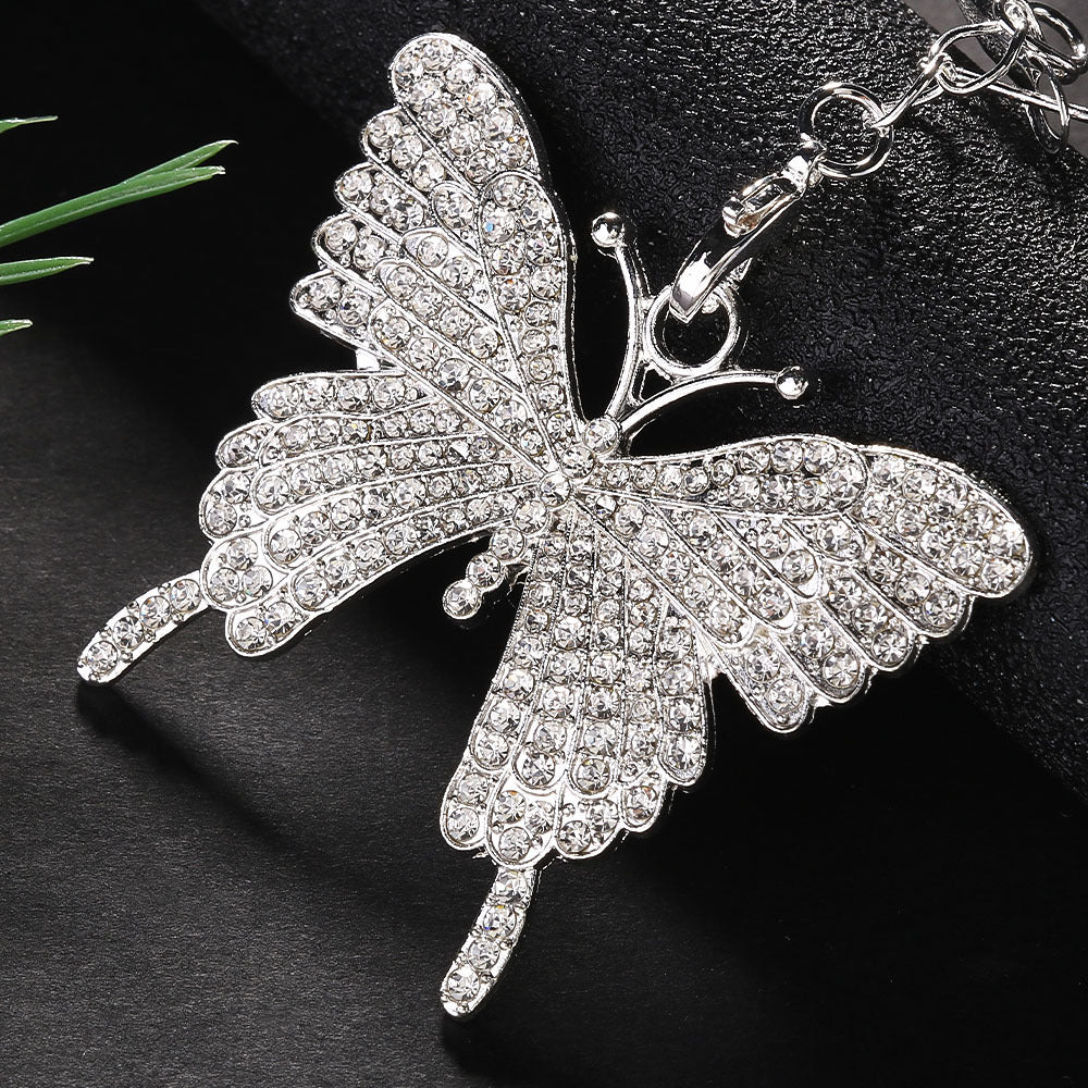 Boucles d'oreilles créoles papillon en strass à la mode exagérée