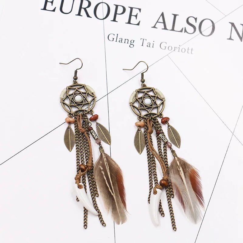 Pendientes bohemios hechos a mano con borlas de plumas huecas