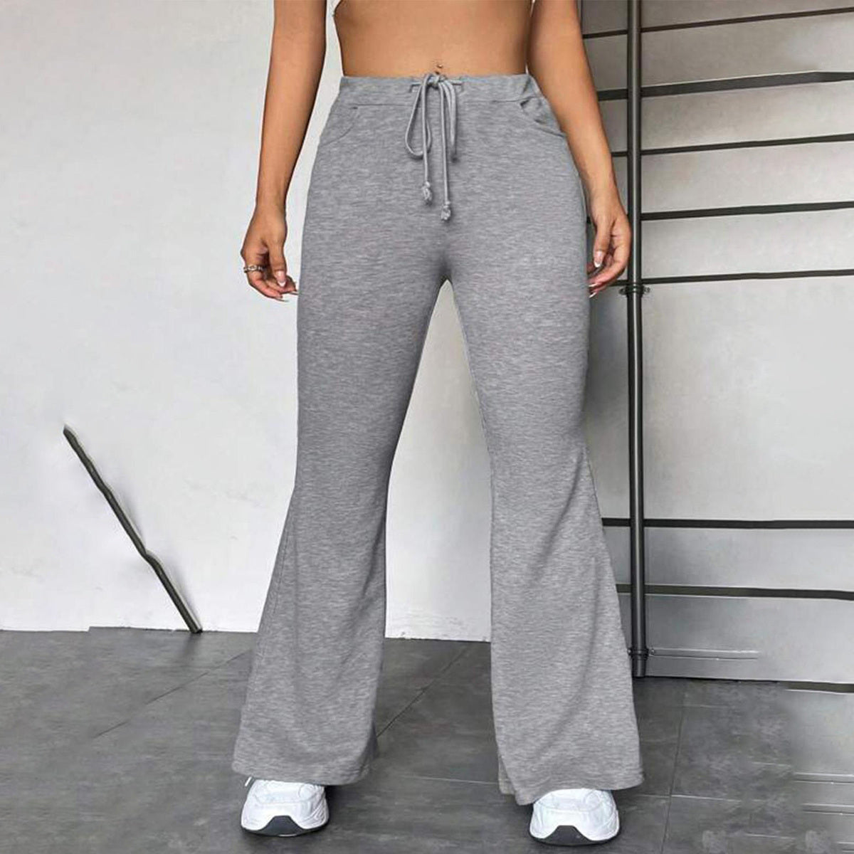Pantalones acampanados con cordón y retazos de talla grande informales a la moda para mujer