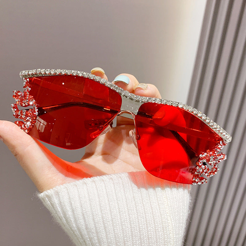 Gafas de sol sin montura con diamantes de imitación de metal irregulares de moda con un estilo único
