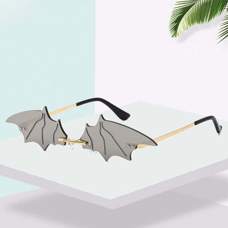 Lunettes de soleil d'Halloween à petite monture en forme de chauve-souris pour femmes