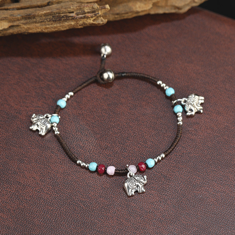 Pulsera tejida a mano con colgante de elefante bohemio