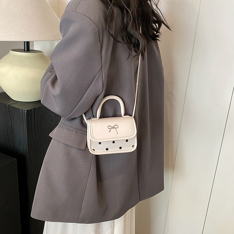 Mini bolso bandolera cuadrado con lazo de moda