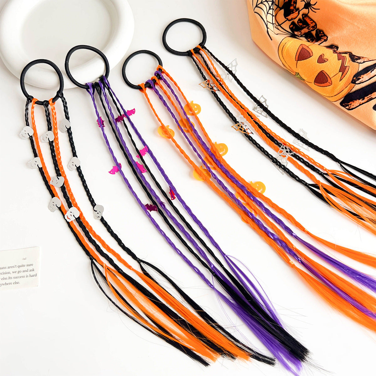 Peluca de murciélago y calabaza con trenzas de colores de Halloween