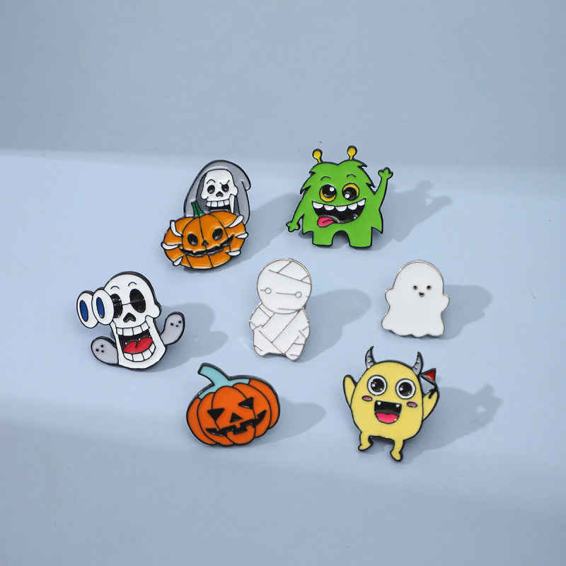 Broche unisexe Halloween en forme de squelette et de momie citrouille