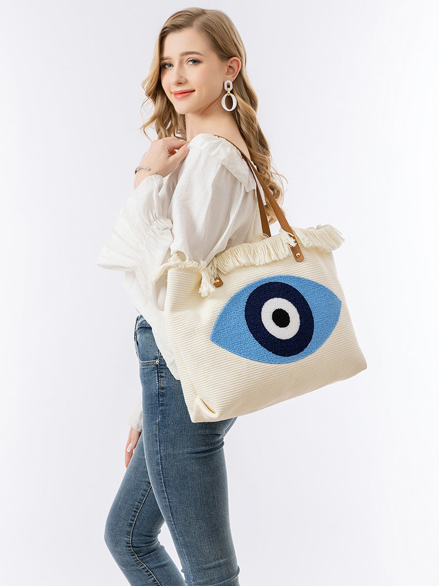Bolsa de lona bordada con ojos bohemios