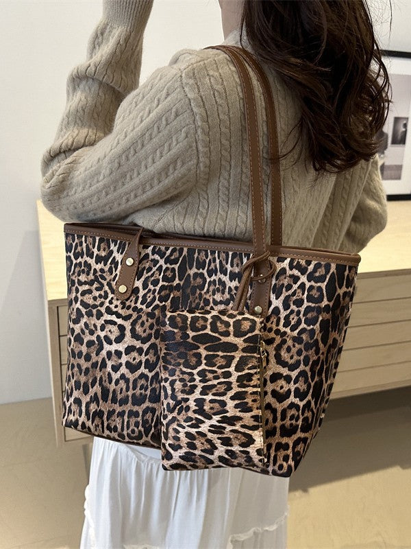 Bolso de mano de gran capacidad con estampado de leopardo y cierre de cremallera.