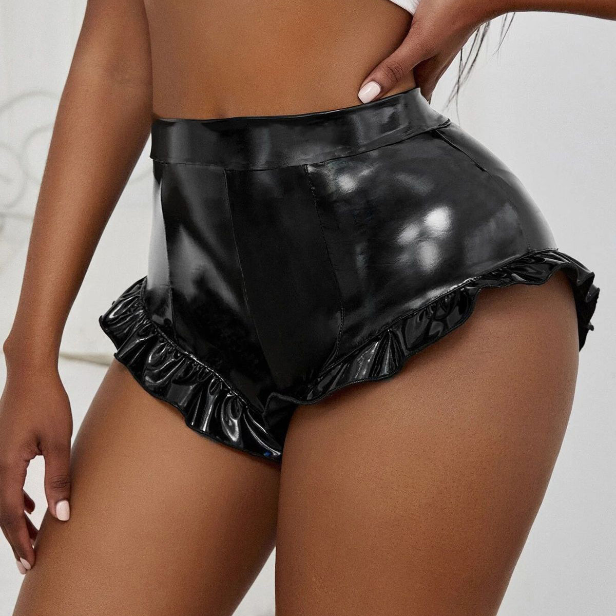 Pantalones cortos de cuero sintético de color liso sexys a la moda para mujer