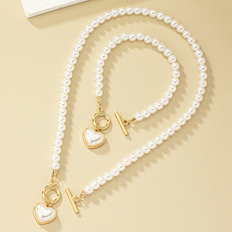 Elegante conjunto de joyas de perlas en forma de corazón