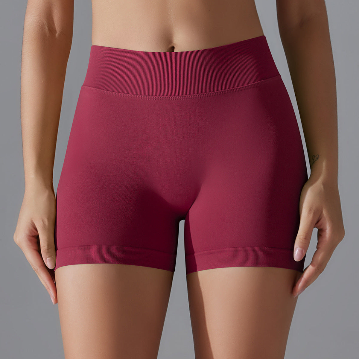 Pantalones cortos deportivos de yoga de color sólido sin costuras sexys para mujer