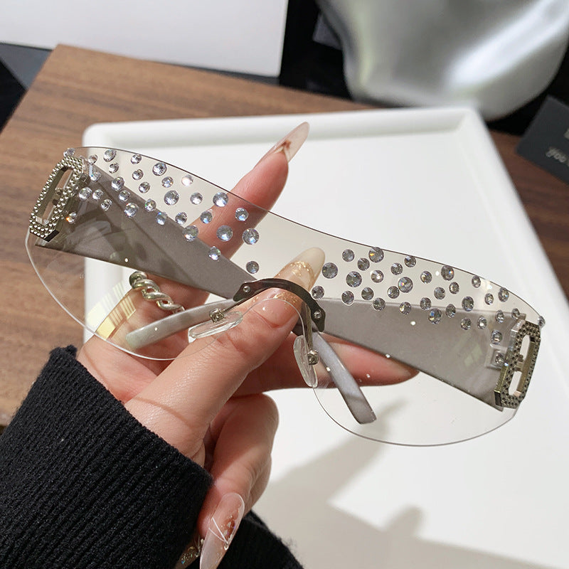 Gafas de sol de moda sin marco de un solo cuerpo con diamantes de imitación