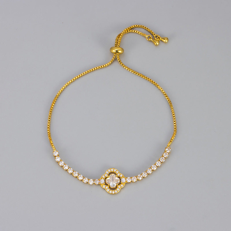 Pulsera de cobre con circonitas y flores de cuatro hojas para mujer
