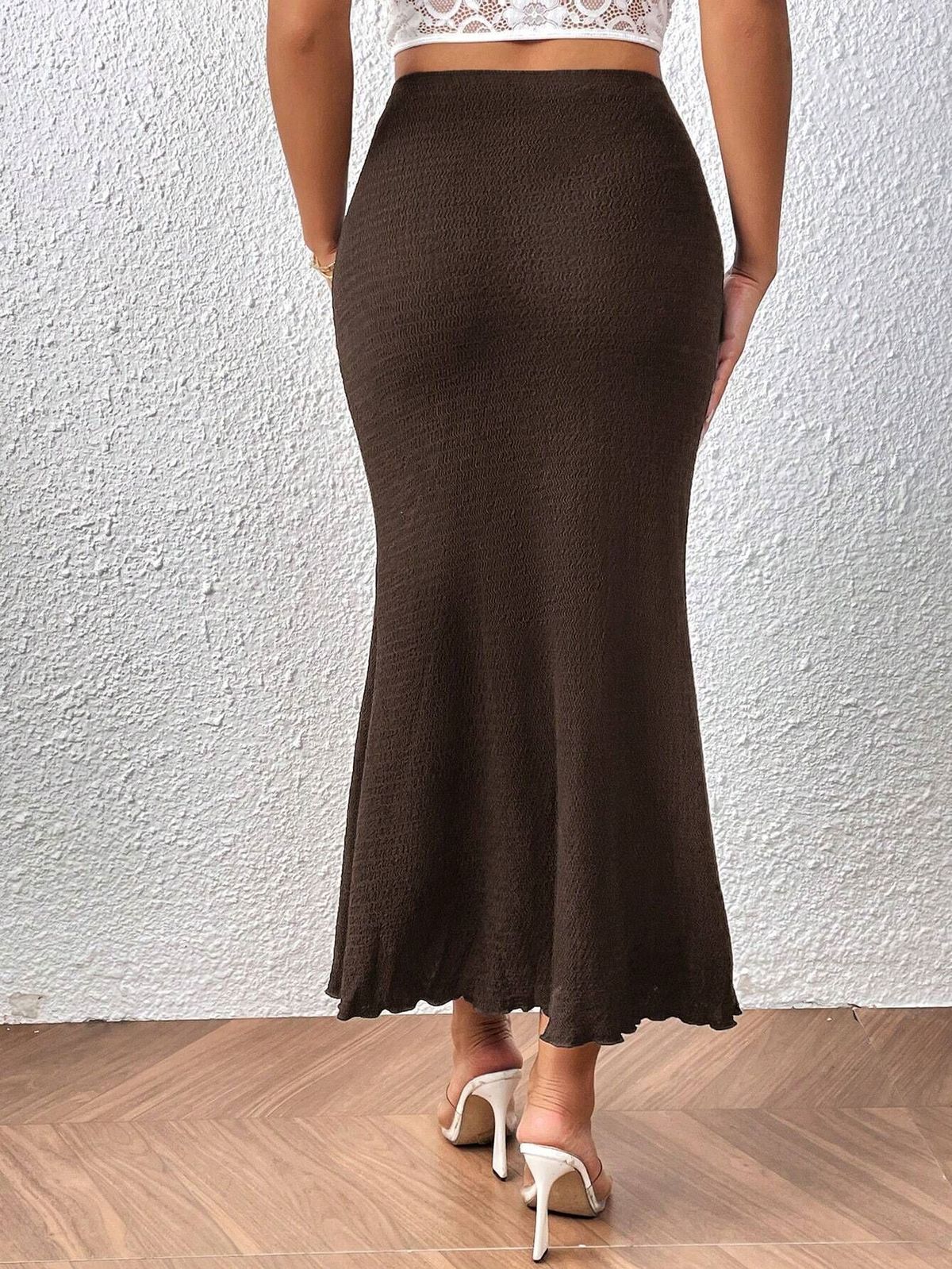 Falda de cola de pez de punto jacquard de cintura alta de color liso elegante para mujer