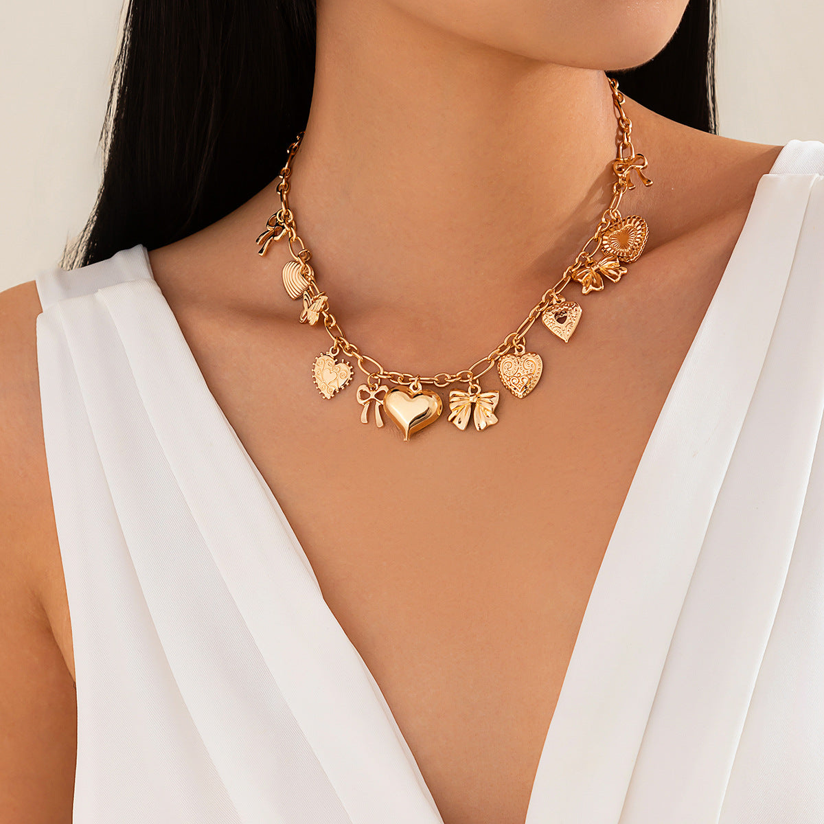 Collar de corazón con lazo de aleación para mujer