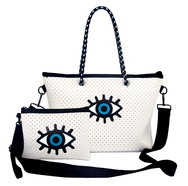 Bolso de mano de gran capacidad con diseño de ojo malvado