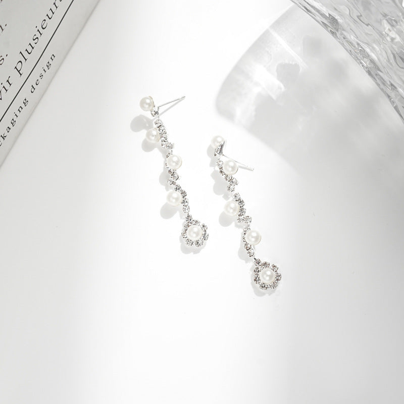 Conjunto de joyas de perlas y diamantes de imitación con temperamento de moda