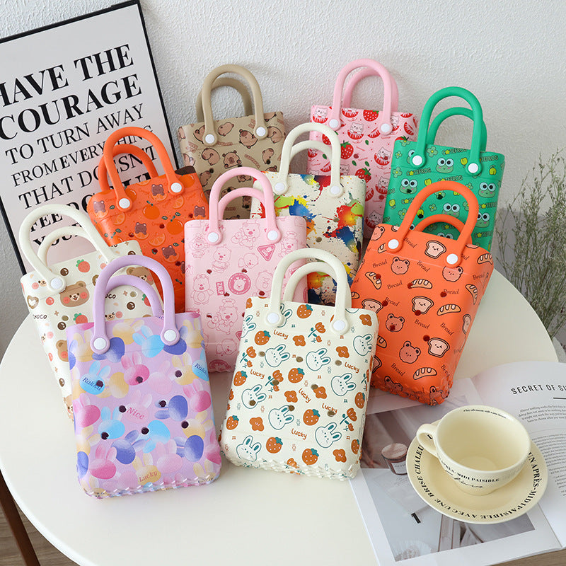 Sac à trou imprimé dessin animé tendance, sac en gelée EVA pour femmes et enfants