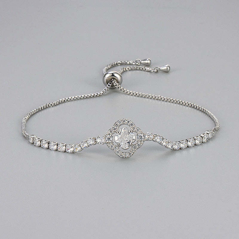 Pulsera de cobre con circonitas y flores de cuatro hojas para mujer