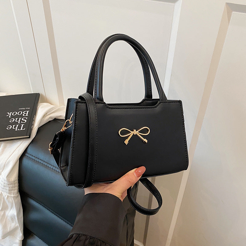 Bolso de mano informal de PU de color sólido con hebilla de lazo para mujer