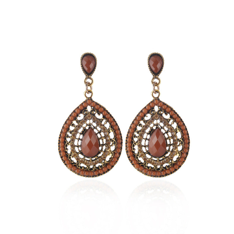Pendientes colgantes con piedras preciosas huecas de estilo bohemio para mujer
