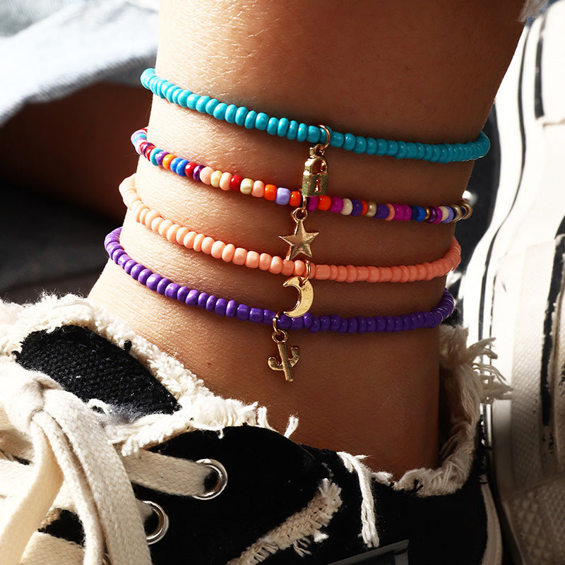Conjunto de tobilleras con candado bohemio, estrella creciente y cactus