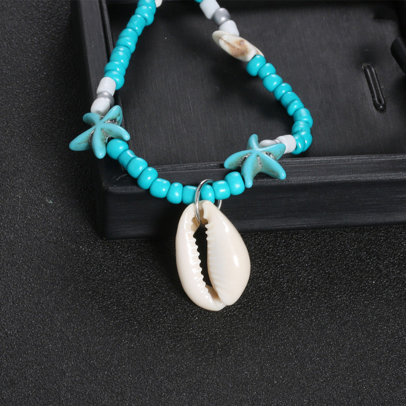Collar de conchas con cuentas turquesas de Bohemia