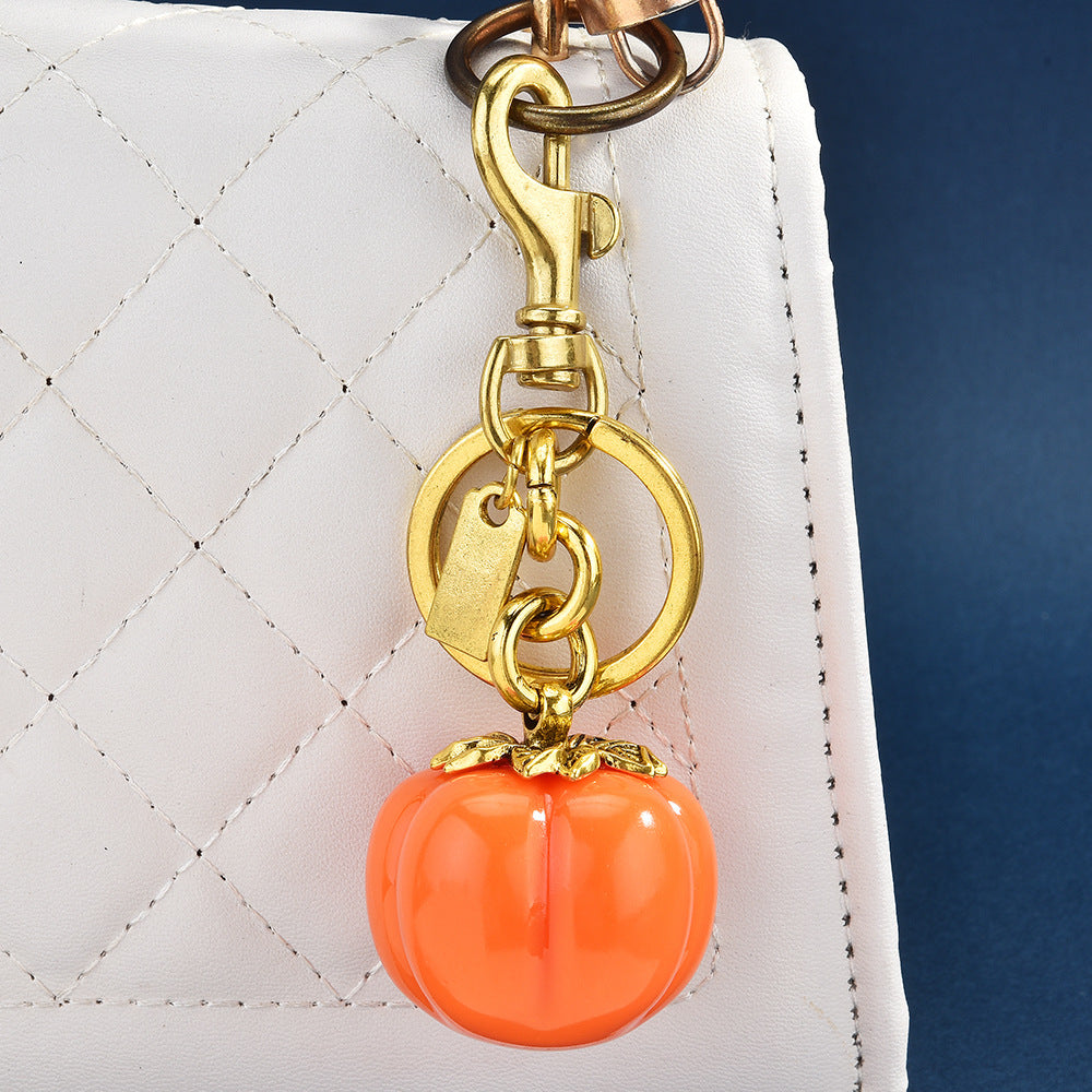 Llavero con colgante de bolsa de caqui de moda - Decoración metálica estilo fruta