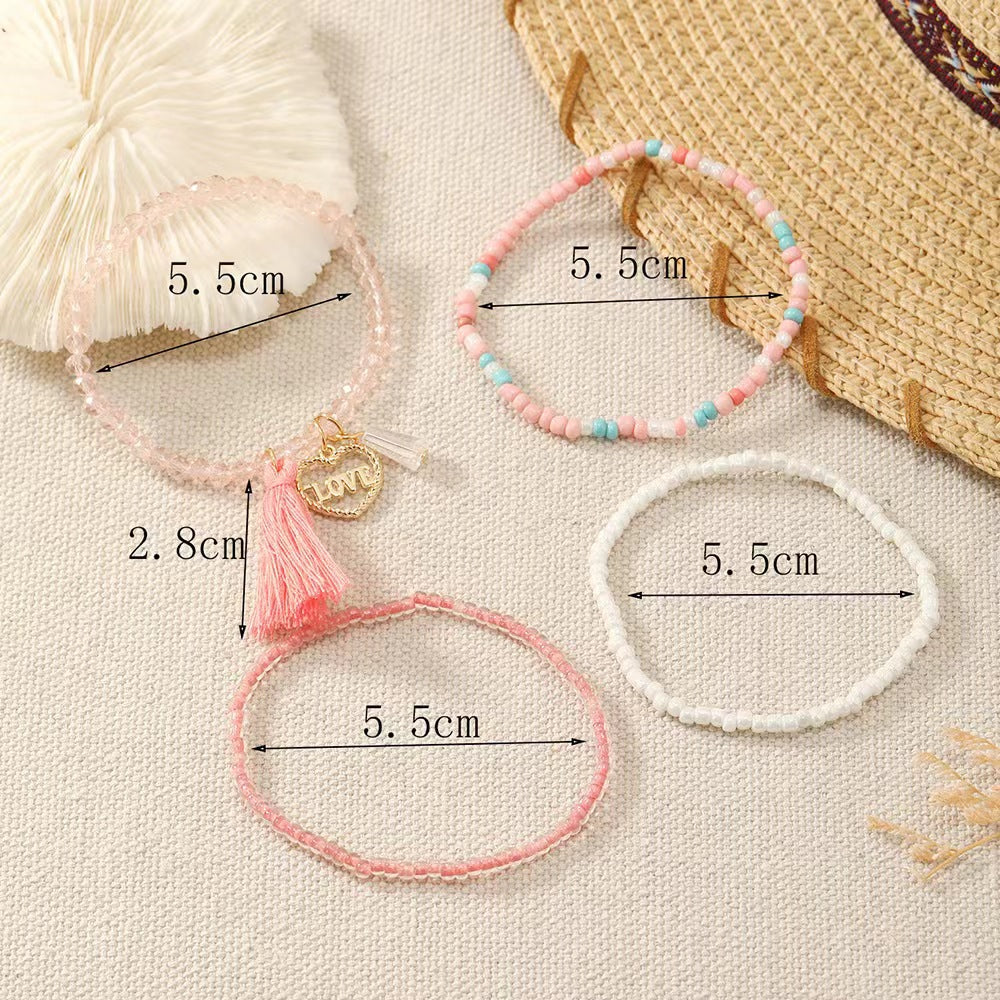 Pulsera de borla rosa con corazón de amor de aleación bohemia