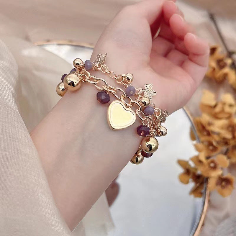 Pulsera bohemia con colgante floral en forma de corazón